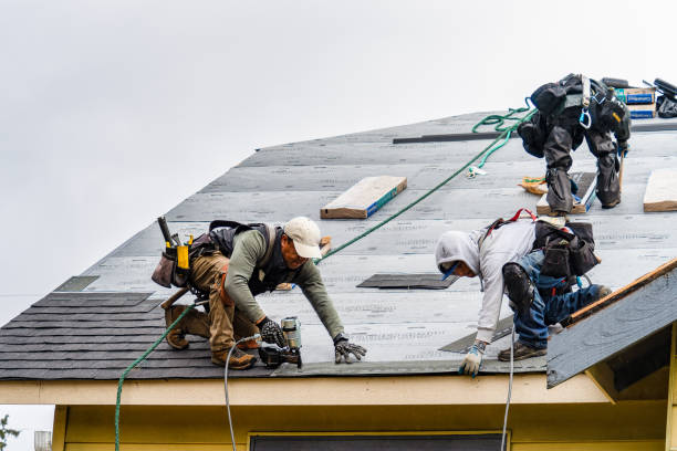 Professional Gutter Installation technician working in North Woodstock, NH